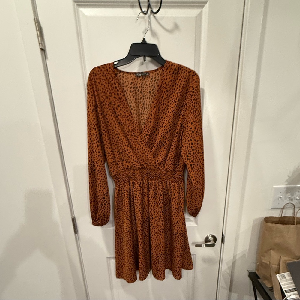 Animal print brown and black long sleeve dress cinched at waist